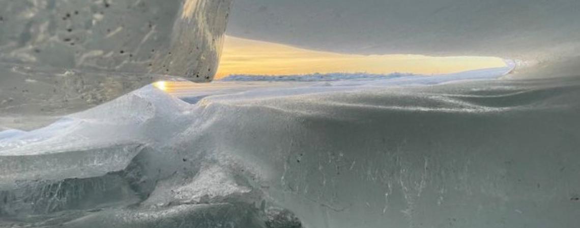 From beneath massive ice slabs, looking east at dawn on Lake Erie...