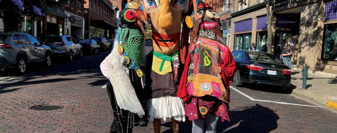 Giant puppets at the Honey for the Heart Parade