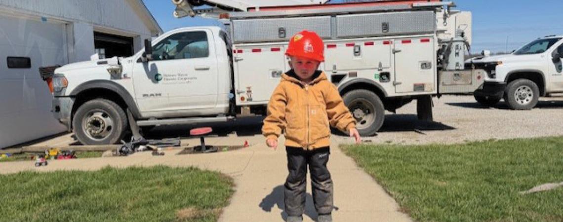 A little boy wearing a bucket hat
