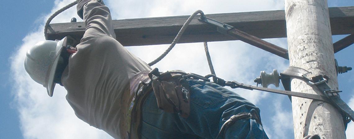 Lineworker on a pole